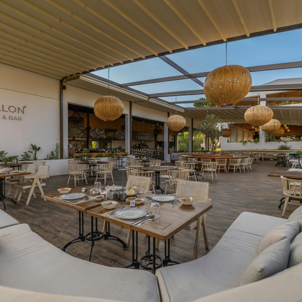 pexels-photo-31089991-31089991 Experience elegant outdoor dining at Apollon Kitchen & Bar in Didim, Türkiye, with stylish decor and ambiance.